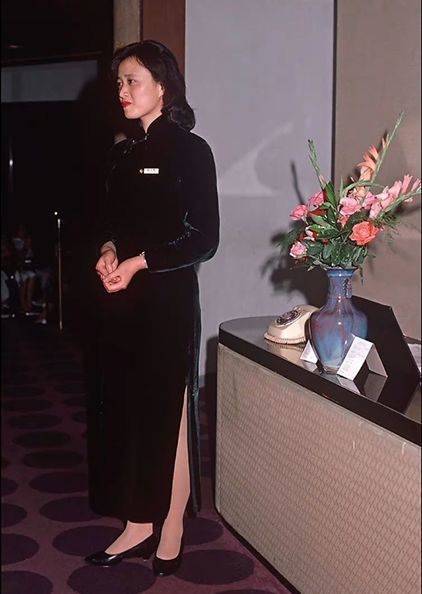 1980s outfits. High-slit cheongsam. Shanghai, China.
