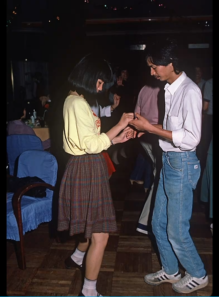 1980s outfits. Young people dancing, Shanghai, China