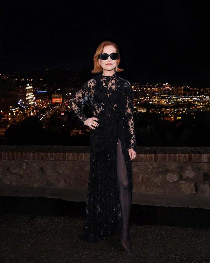 Isabelle Huppert Wears a Black Cut-Out Sequin Cape Dress from Balenciaga’s Fall/Winter 2025 Collection