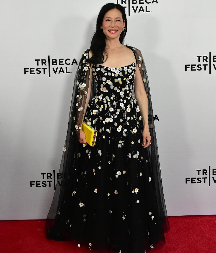 Lucy Liu appeared at the TribecaFilmFestival wearing a gown adorned with small daisies.