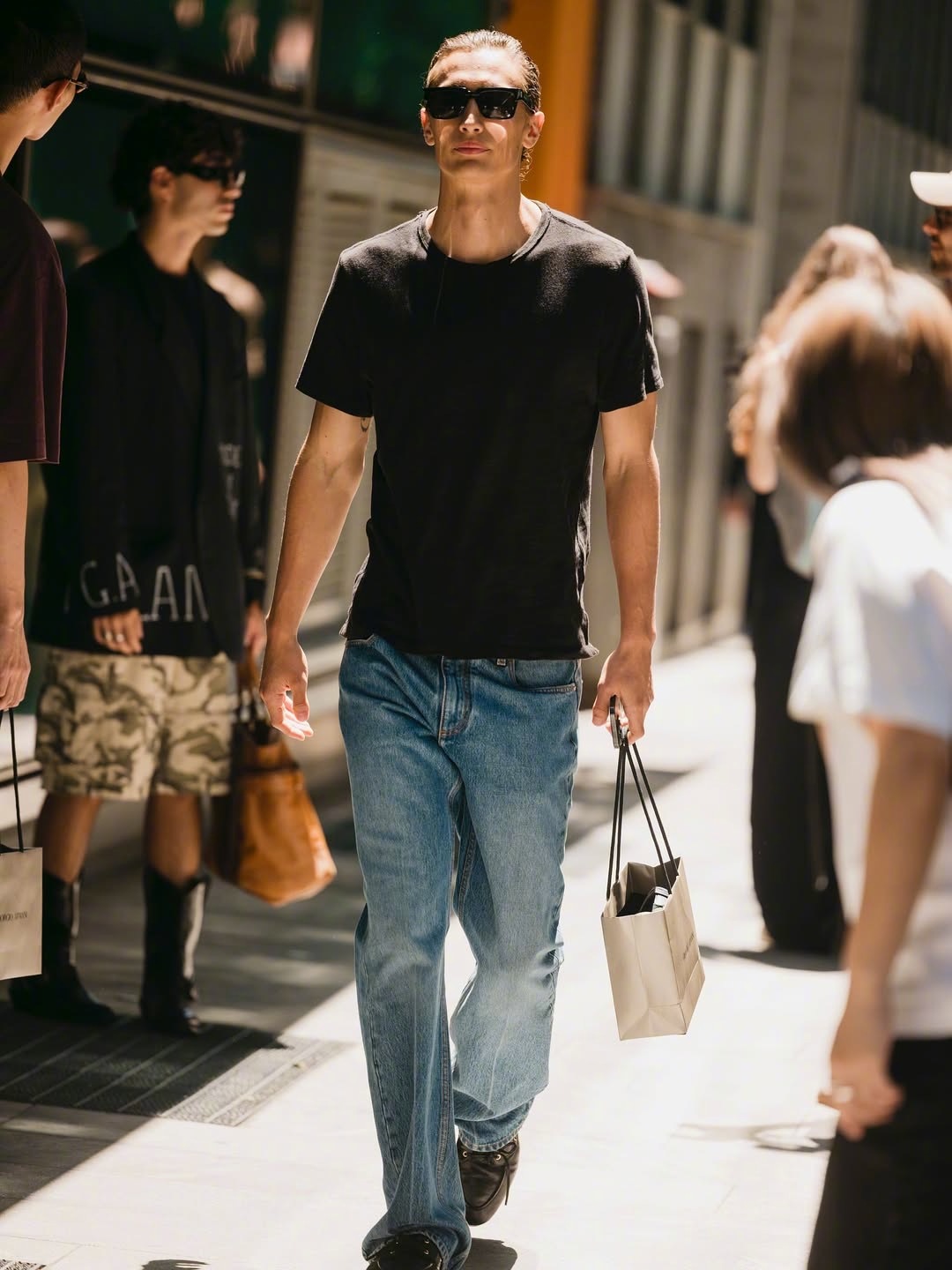 Giorgio Armani male model in T-shirt & jeans