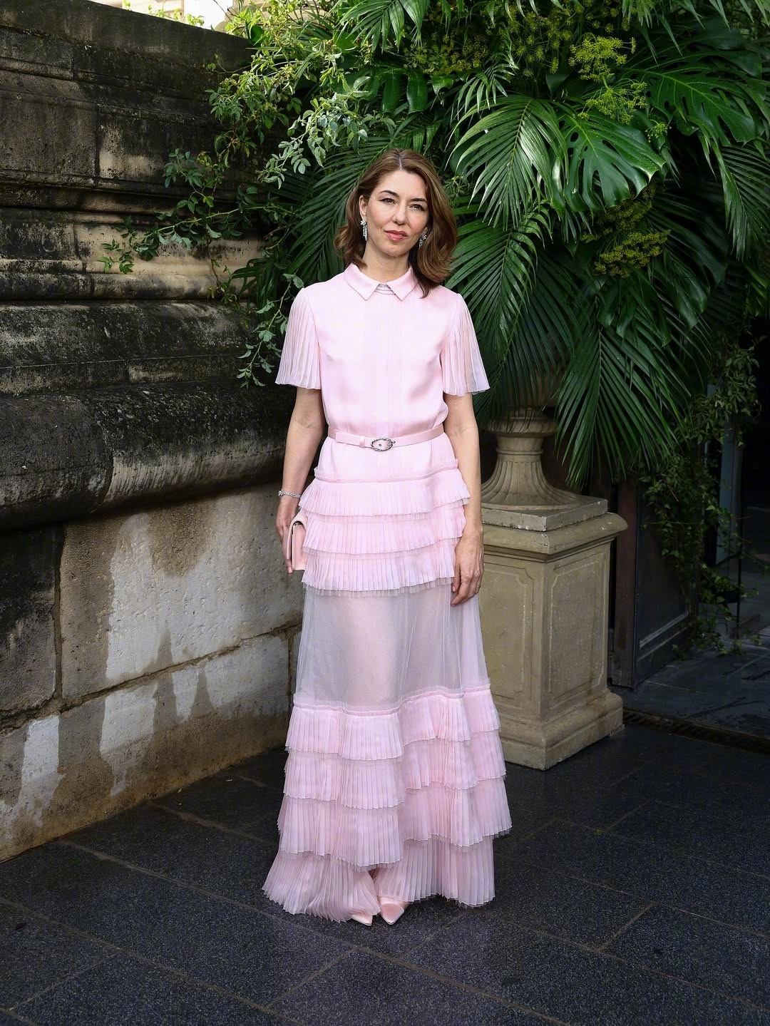 Sofia Coppola in a see-through pink pleated dress