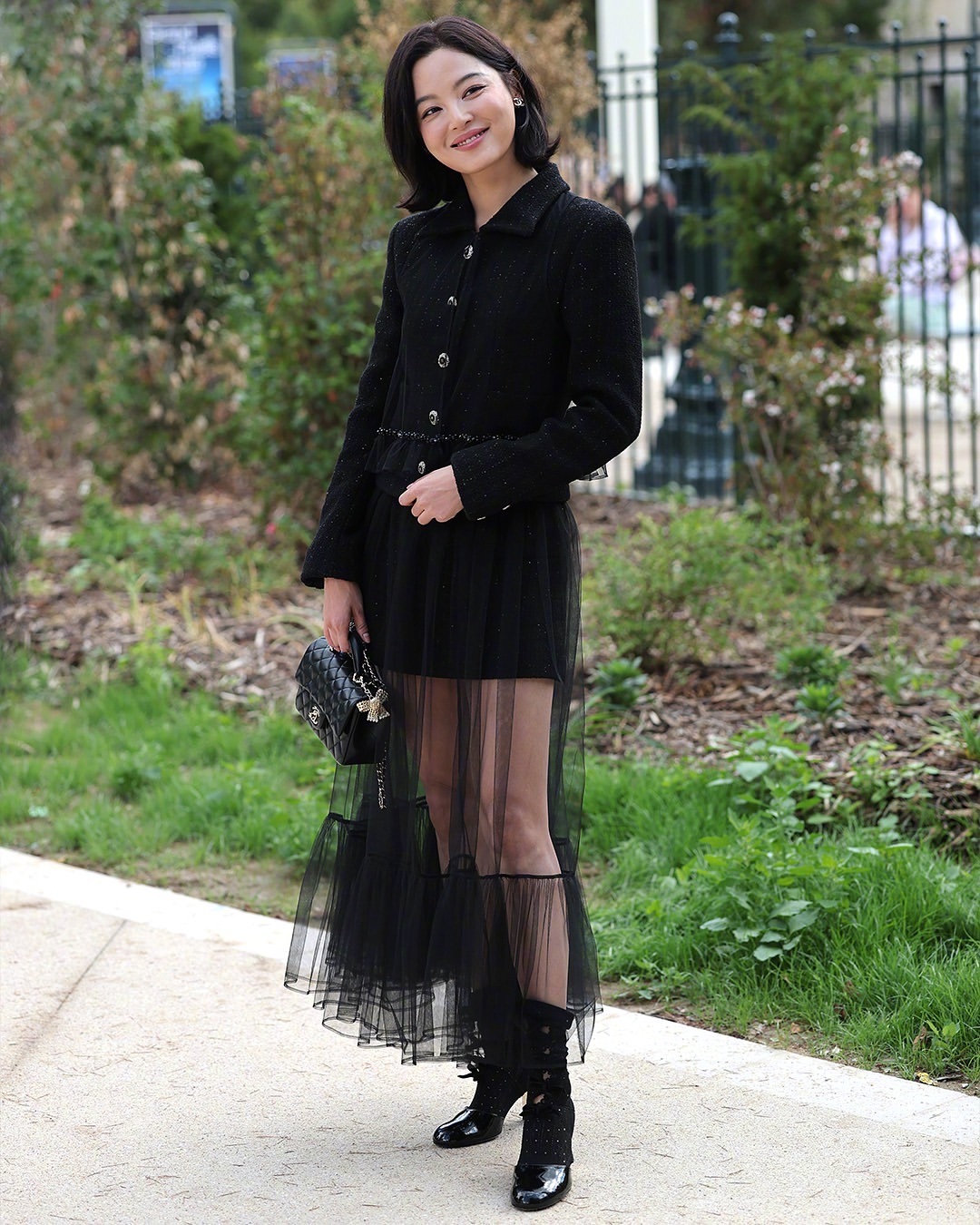 Elegant sheer skirt paired with black jacket