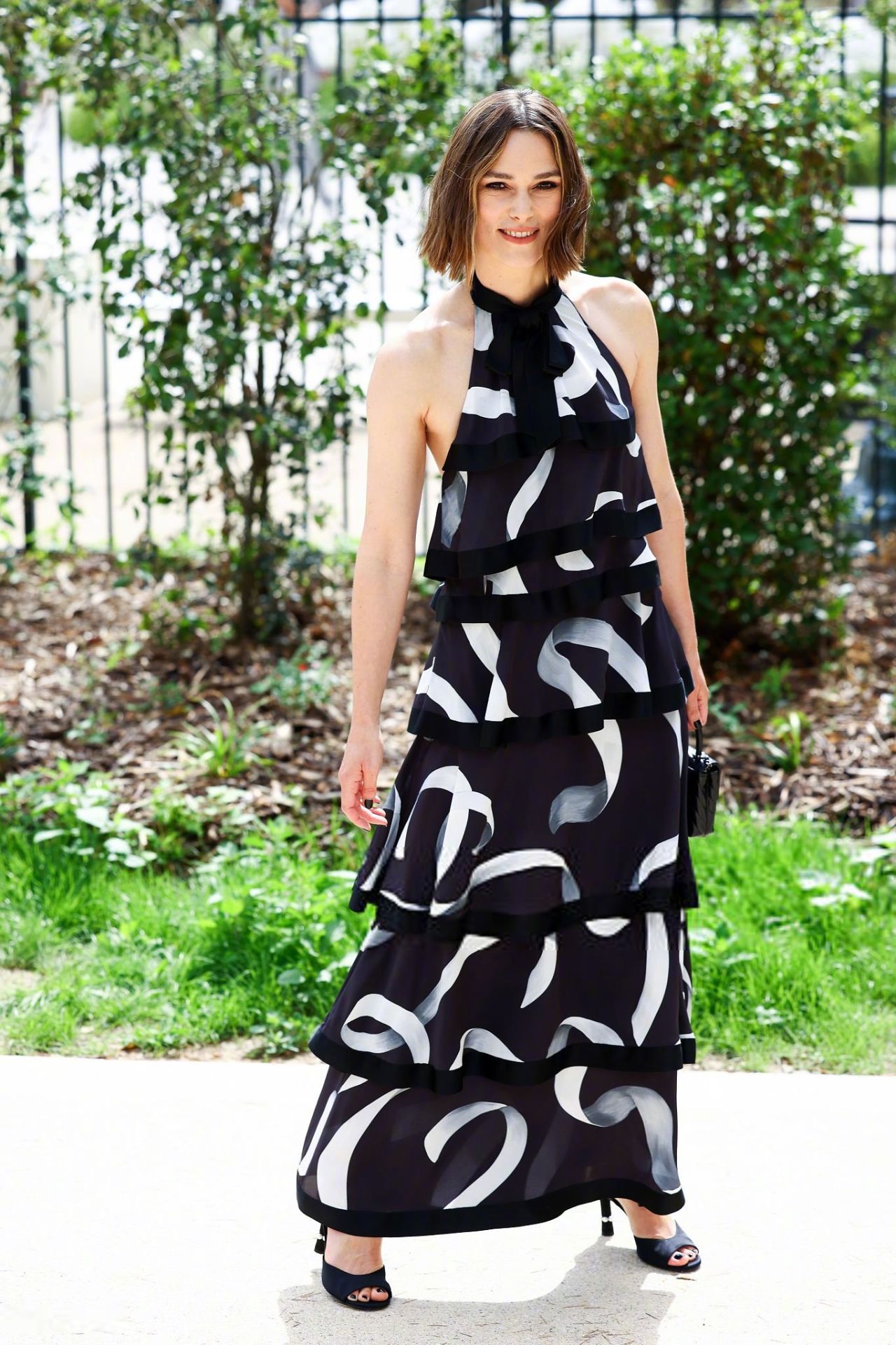 Keira Knightley is wearing a dress from CHANEL's Fall/Winter 2025 collection.