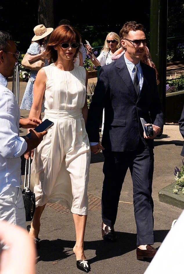 Benedict Cumberbatch with a moustache and wife Sophie Hunter at Wimbledon