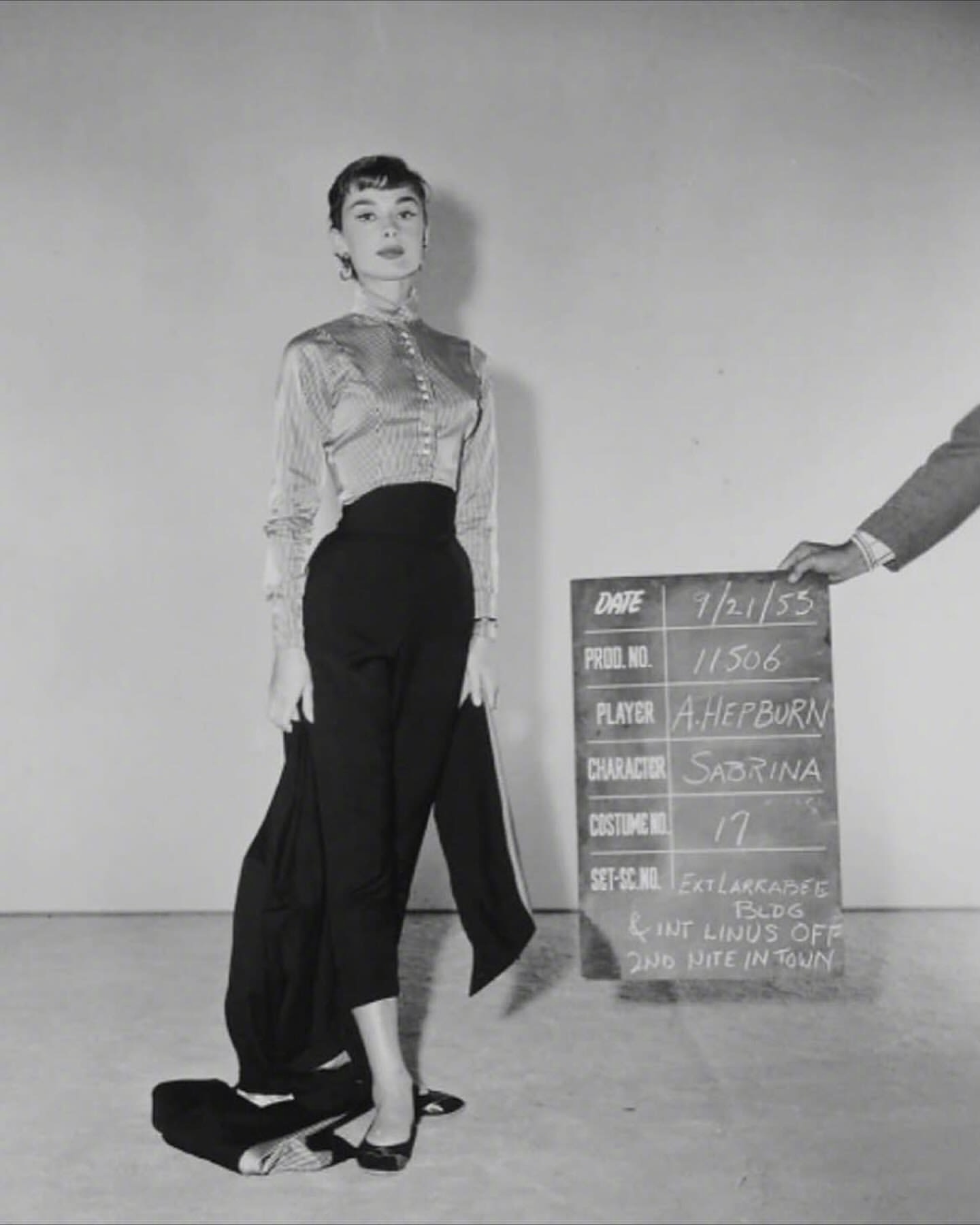 Audrey Hepburn auditioning for the film Sabrina in 1954. Outfit 5: High-neck blouse ensemble