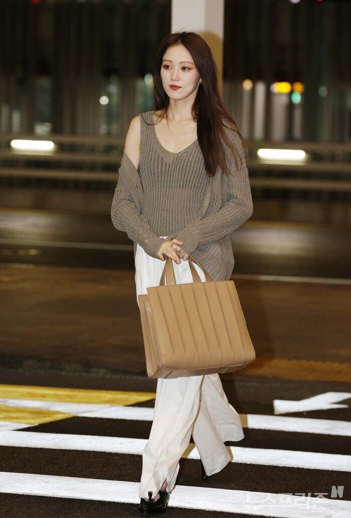 Elegant knit sweater paired with wide-legged pants