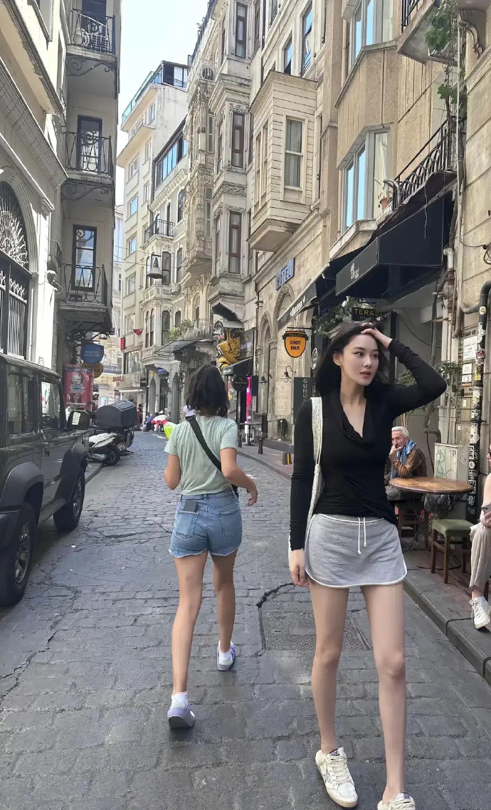 On the summer streets, denim shorts and miniskirts.