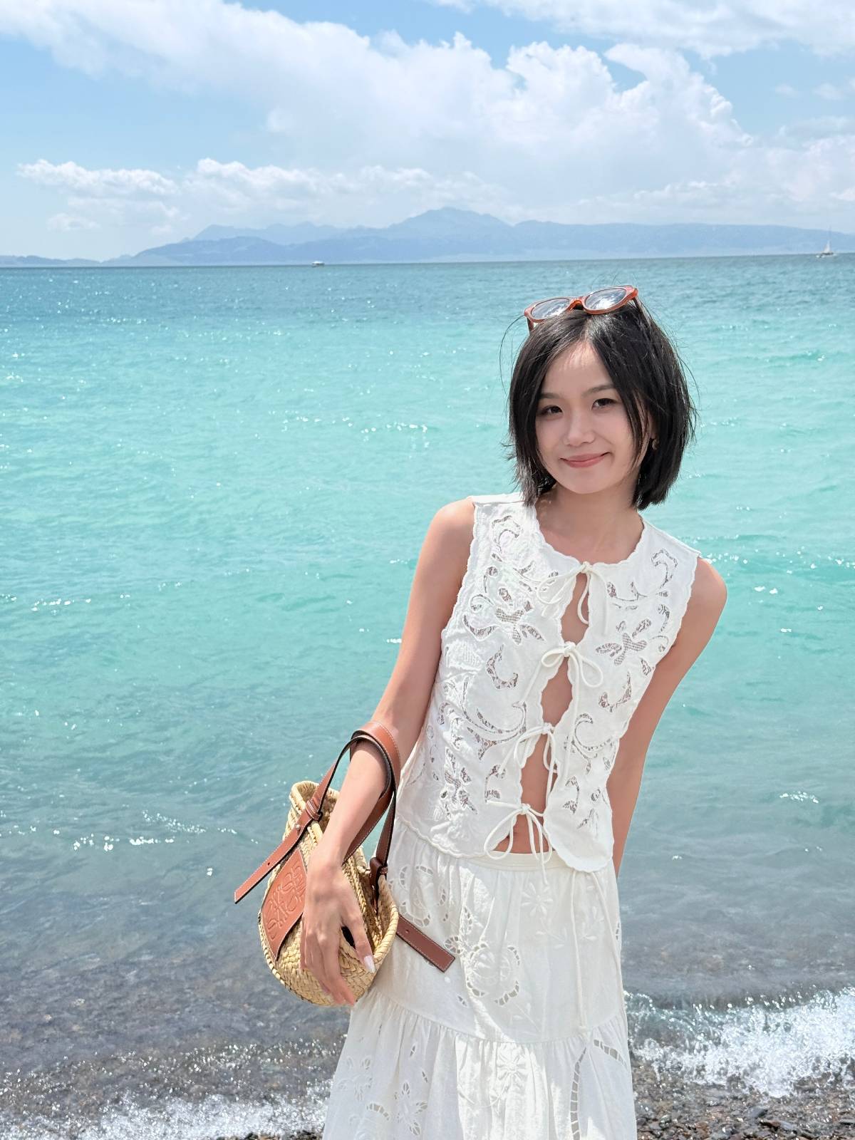 Summer Limited Edition Clothing: Sleeveless lace top paired with a matching white lace skirt