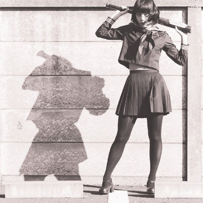 A young girl wearing a JK uniform.