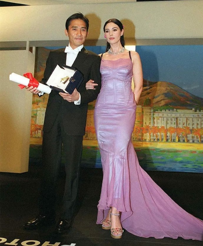 Monica Bellucci and Tony Leung’s Outfits on Stage at Cannes in 2000