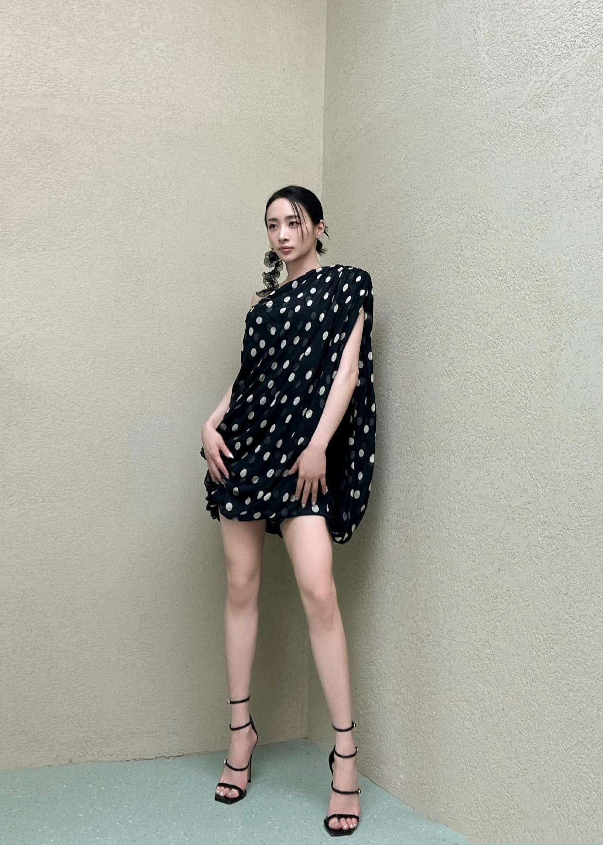 One shoulder black and white polka dot mini dress