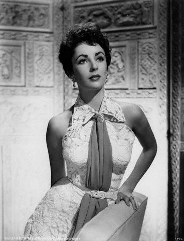 Elegant dress paired with halter neck. Elizabeth Taylor.