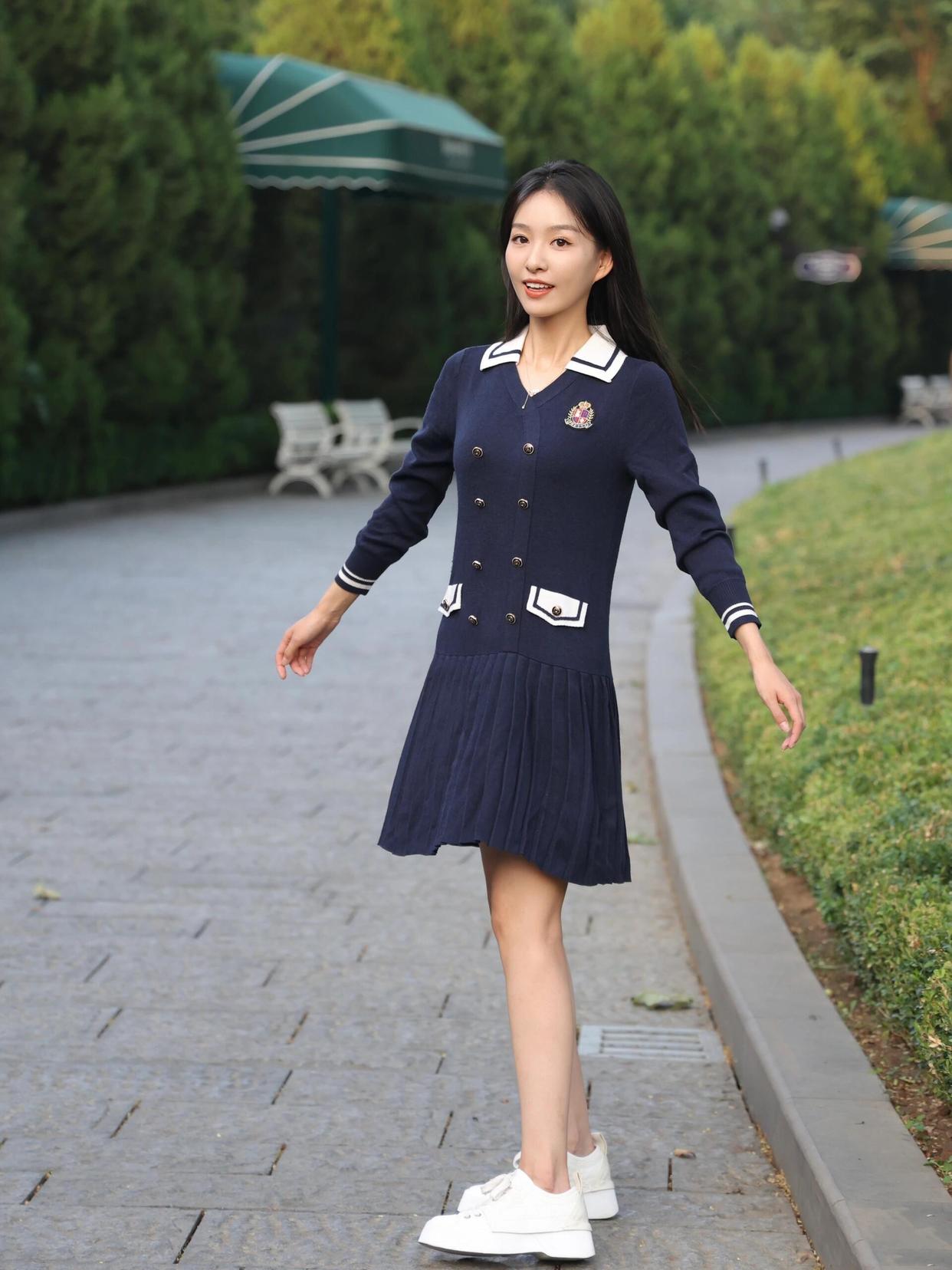 Preppy style, blue pleated skirt