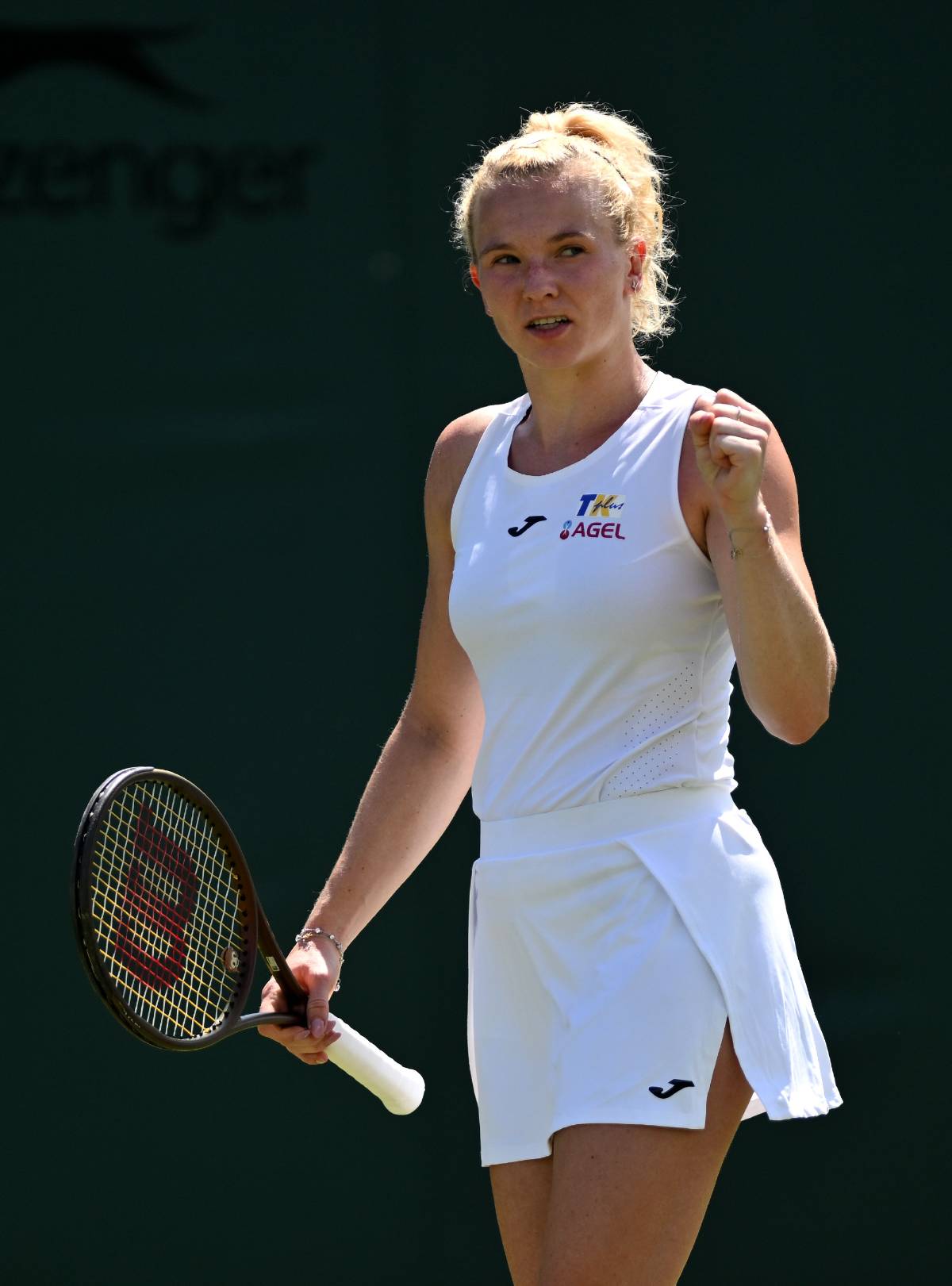 Siniakova at Wimbledon. Tennis tank top with tennis shorts