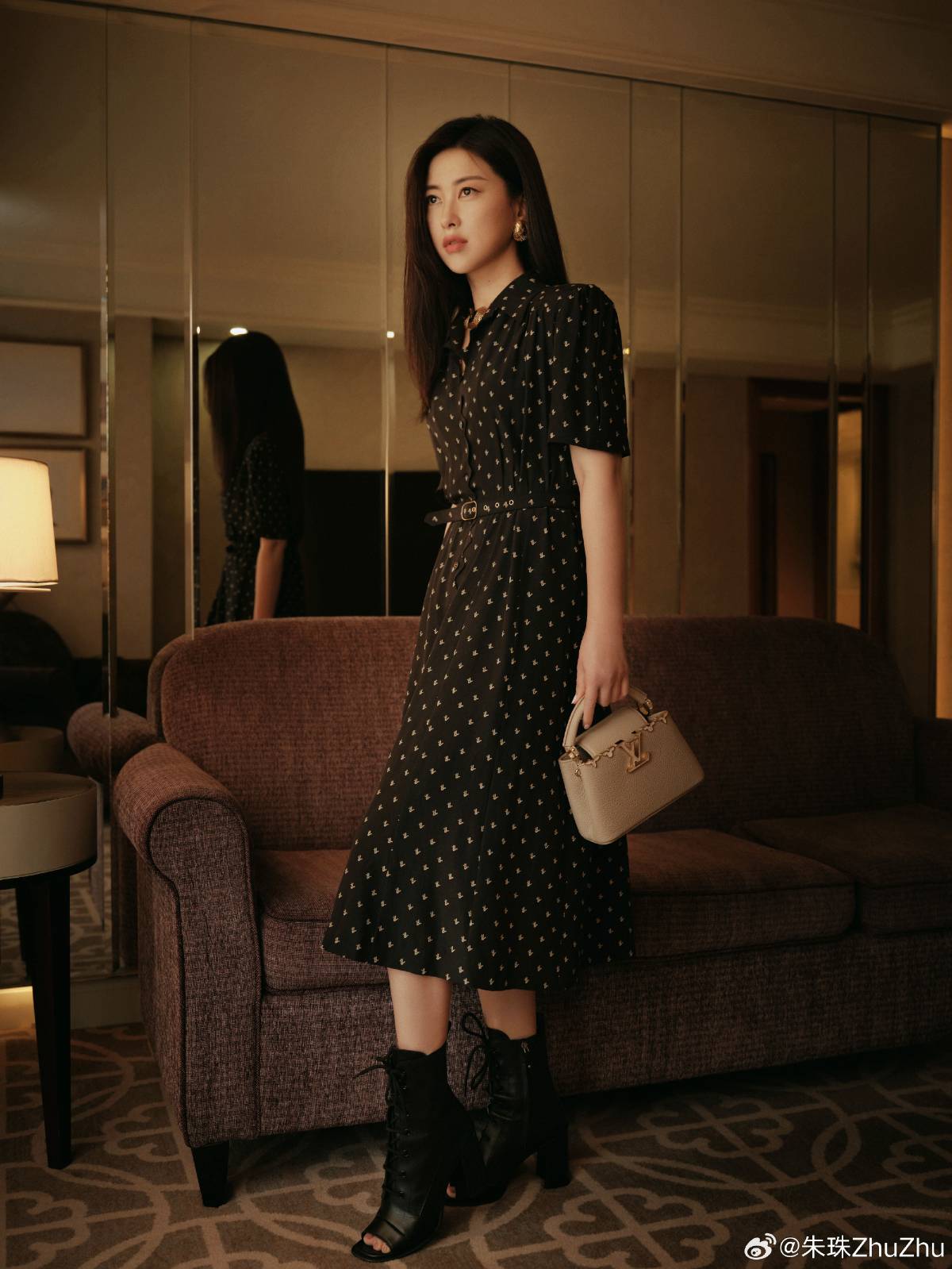 Actress Zhu Zhu in an elegant midi dress & lace-up boots combination