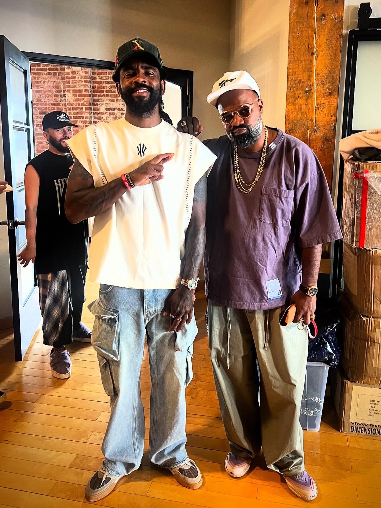 Kyrie Irving in sleeveless top paired with cargo pants