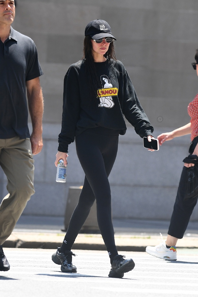 Dakota Johnson street style: Sweatshirt & leggings combination