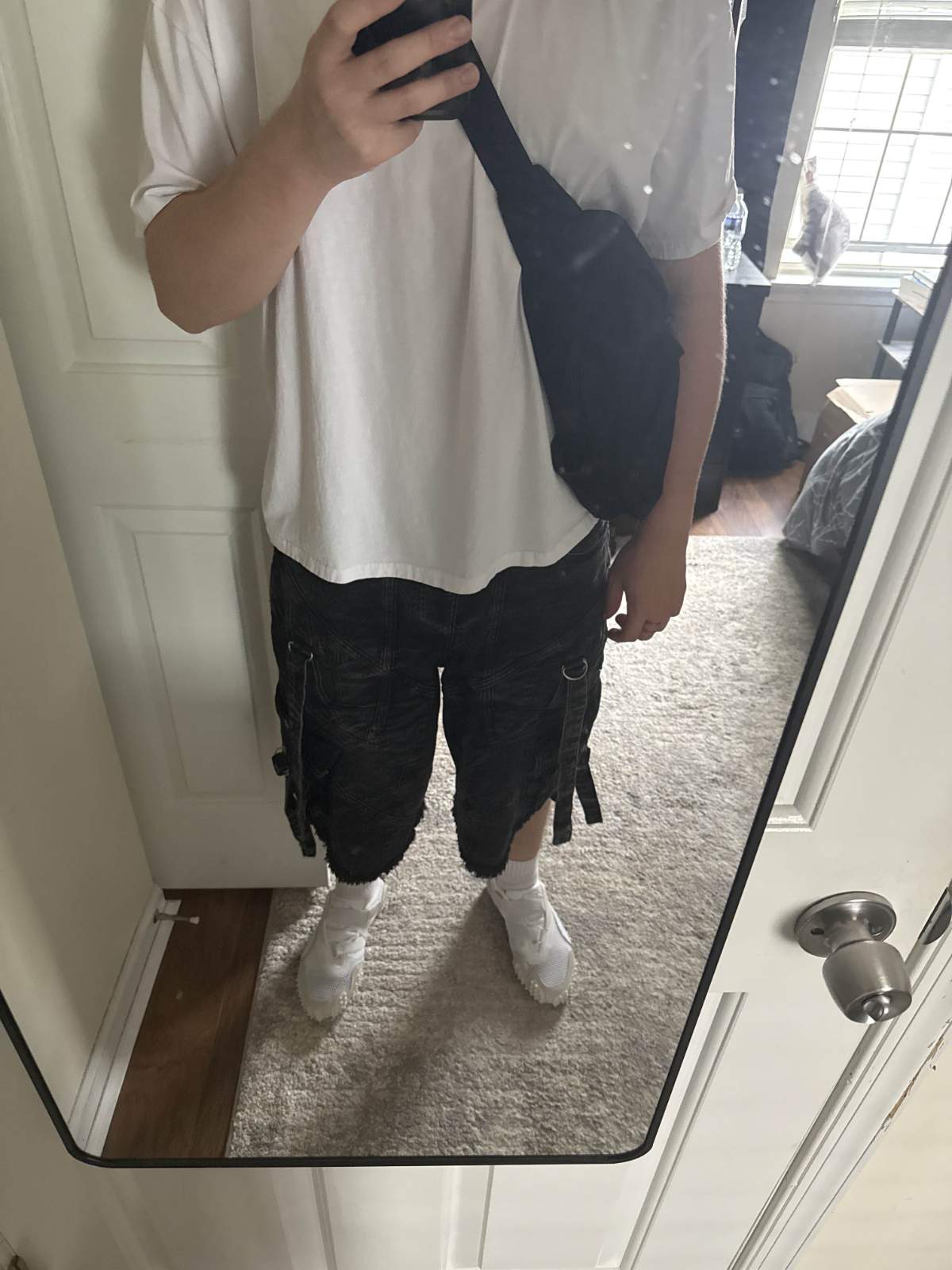 White t-shirt with baggy shorts summer