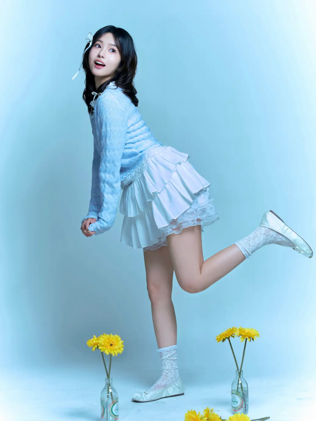 A Chinese girl's sky-blue sweet 16 outfit, designed for an adorable and sweet look.