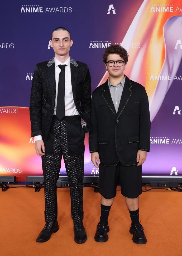 Finn Wolfhard and Gaten Matarazzo attended the Crunchyroll Anime Awards in Tokyo, showcasing their unique red carpet looks.