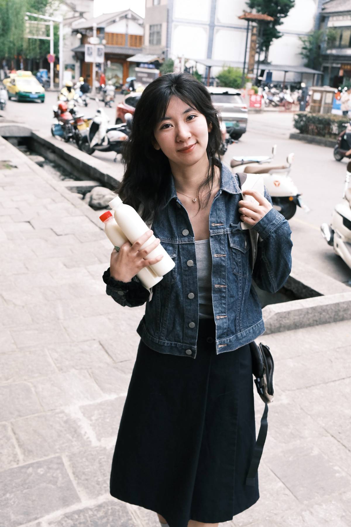 Denim jacket & black skirt combination