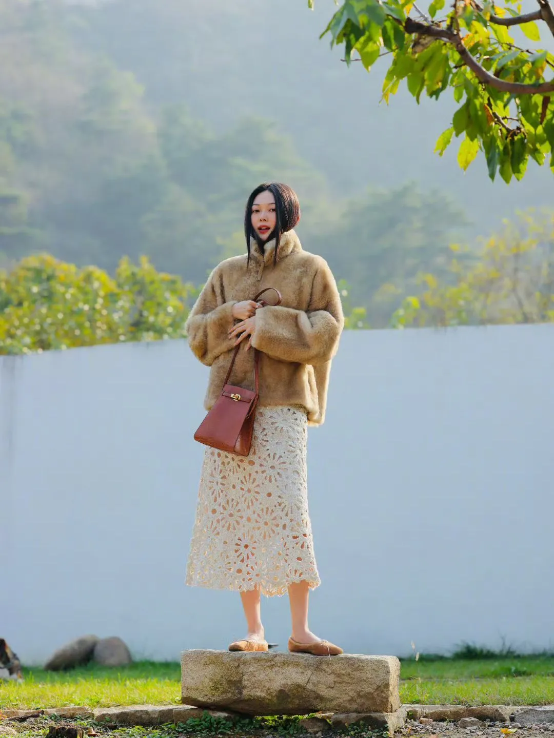 Elegant Autumn Ensemble with Faux Fur Jacket and Lace Skirt