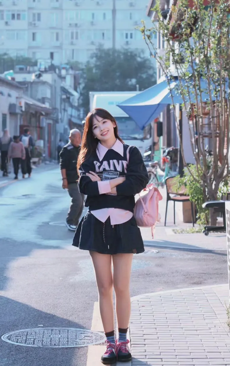 Trendy Black Sweater and Skirt with Pastel Accents for a Youthful Look