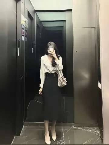 Elegant White Blouse and Black High-Waisted Skirt Ensemble for a Classic Look