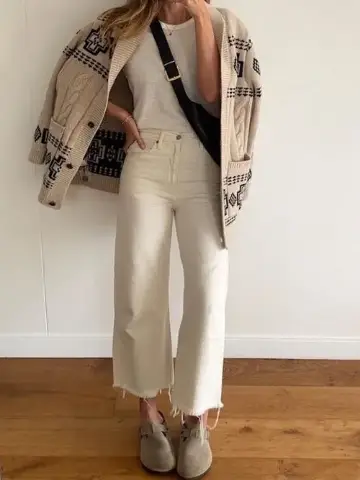 Cozy Neutral Tones: Patterned Cardigan with Cream Wide-Leg Pants and Frayed Hems