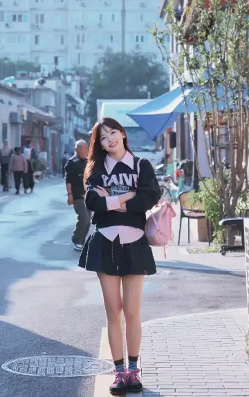 Trendy Black Sweater and Skirt with Pastel Accents for a Youthful Look