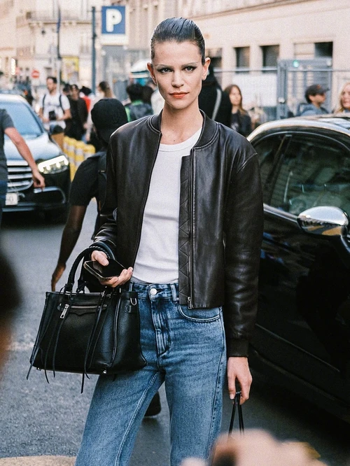 Effortlessly Chic: Black Leather Bomber Jacket with White Tee and High-Waisted Jeans