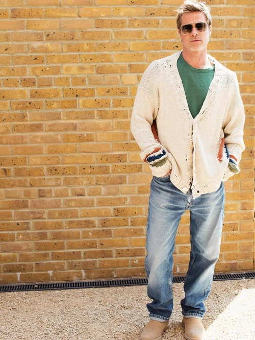 Brad Pitt, behind the scenes of F1. Casual Knit Cardigan with Distressed Jeans and Neutral Boots