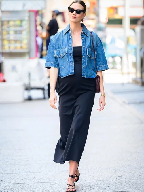Karlie Kloss. Effortlessly Chic: Denim Jacket with Black Maxi Dress for Stylish Day Out