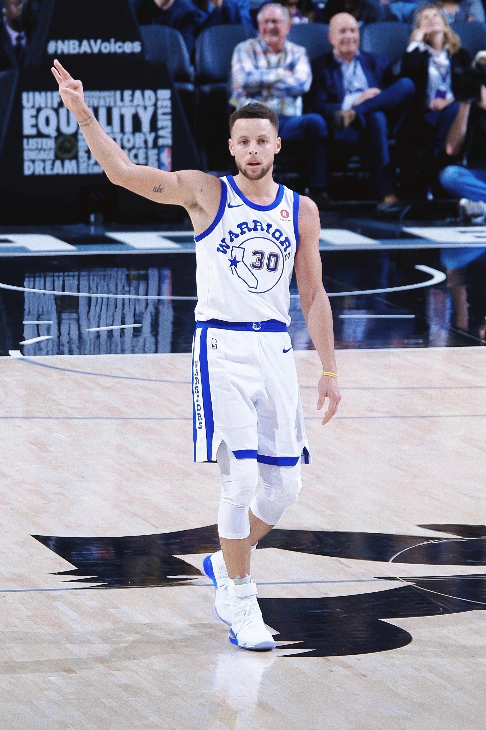 Curry in Classic Basketball Uniform Featuring White and Blue Accents for a Bold and Sporty Look