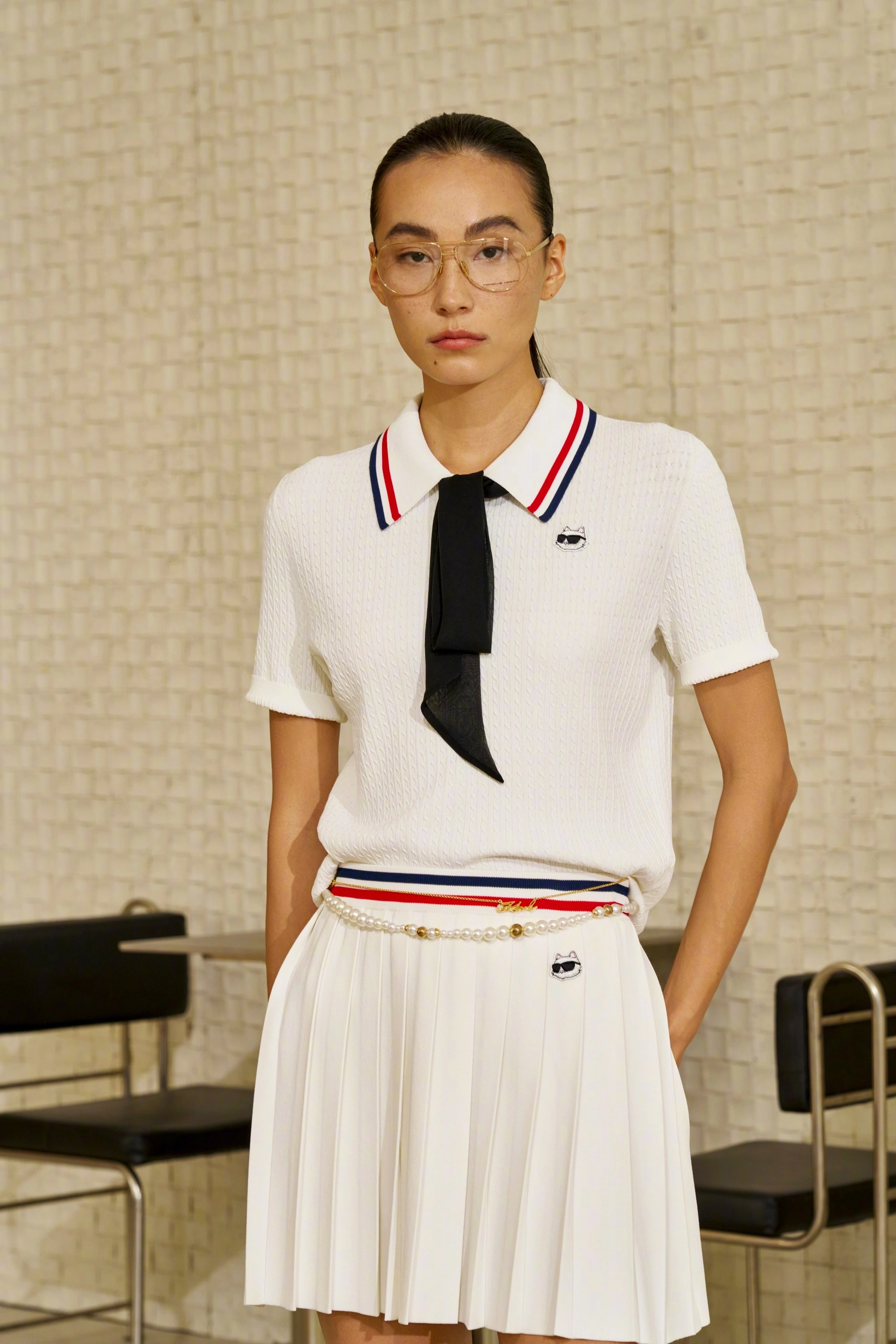 Classic White Knit Top and Pleated Skirt Ensemble with Tricolor Details