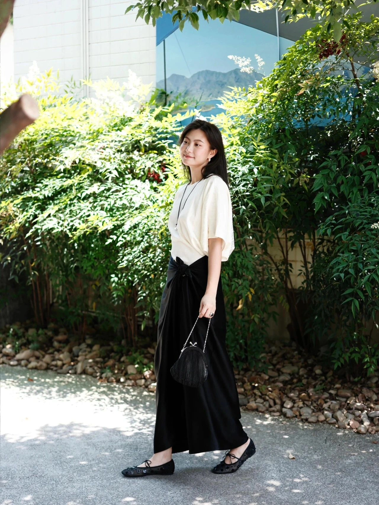 Timeless Elegance with a Cream Top and Black Maxi Skirt Ensemble