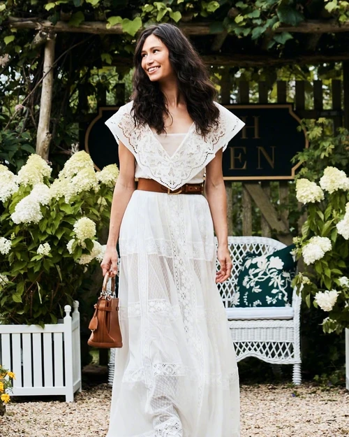 Romantic White Lace Maxi Dress with Brown Accessories for a Vintage Garden Look