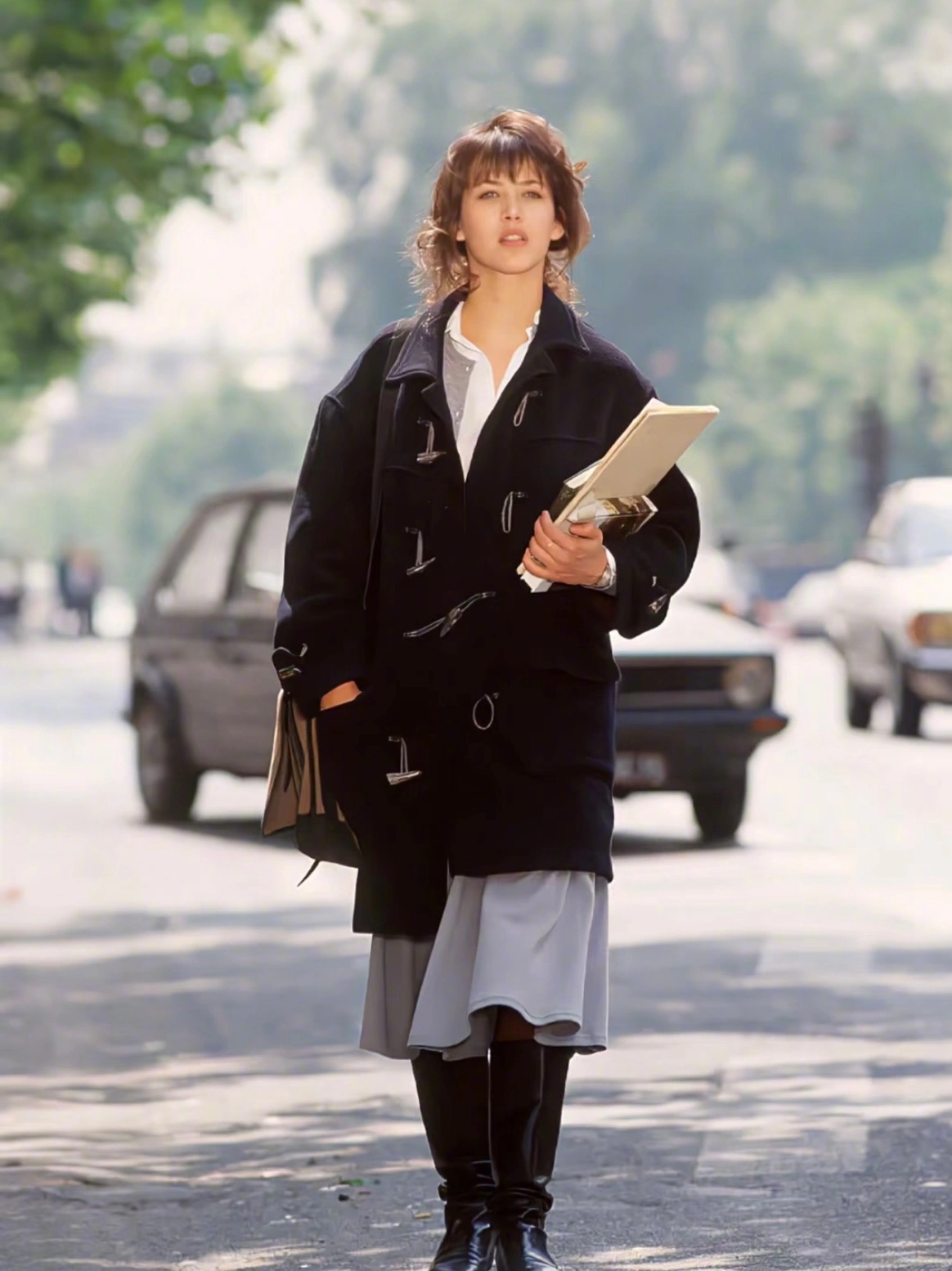 Stylish Streetwear Inspired by Oversized Black Coat with Gray Midi Skirt and Knee-High Boots
