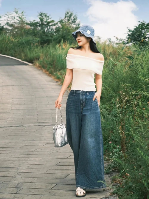 Chic Off-Shoulder Top and Wide-Leg Denim Paired with Trendy Bucket Hat