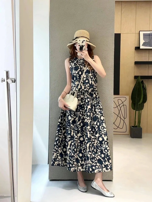 Floral Midi Dress with Straw Hat and Silver Flats for a Summery Casual Look