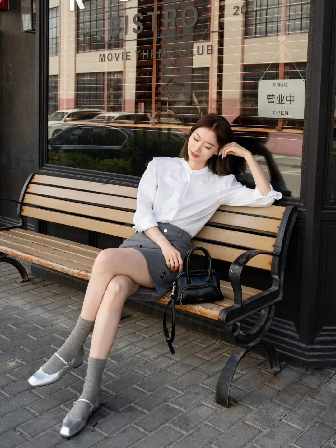 Elegant Combination of White Blouse and Grey Skirt with Silver Heels