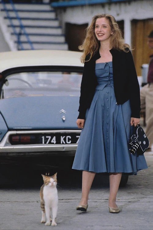 Elegant Blue Midi Dress with Black Cardigan and Timeless Accessories for a Vintage Day Look