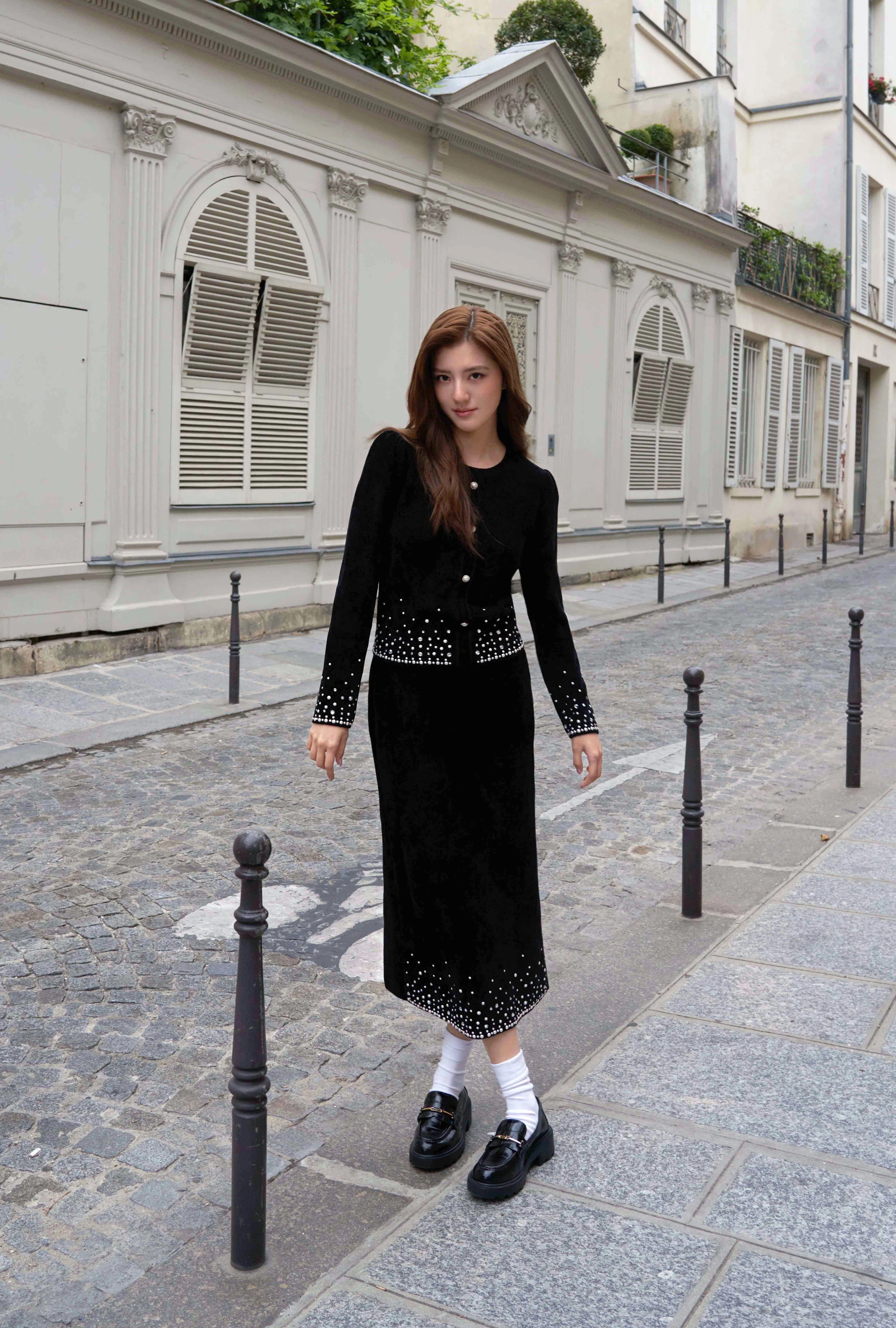 Elegant Black Ensemble with White Bead Detailing and Classic Loafers