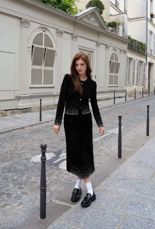 Elegant Black Ensemble with White Bead Detailing and Classic Loafers