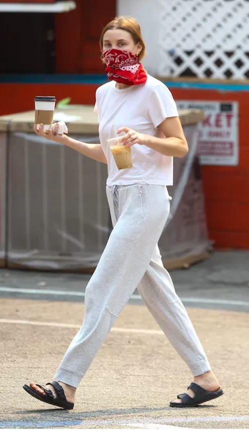 Casual Comfort at Its Most Basic: White T-Shirt, Grey Sweatpants, Black Sandals