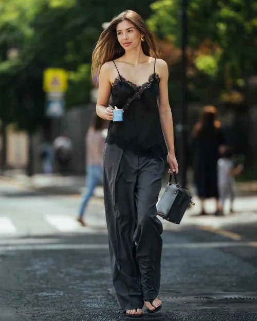 Effortless Elegance with a Black Lace Camisole and Charcoal Trousers Ensemble