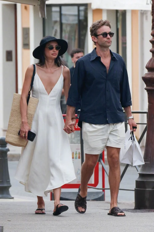 Chic White Summer Dress with Black Accents and Straw Accessories for Effortless Style