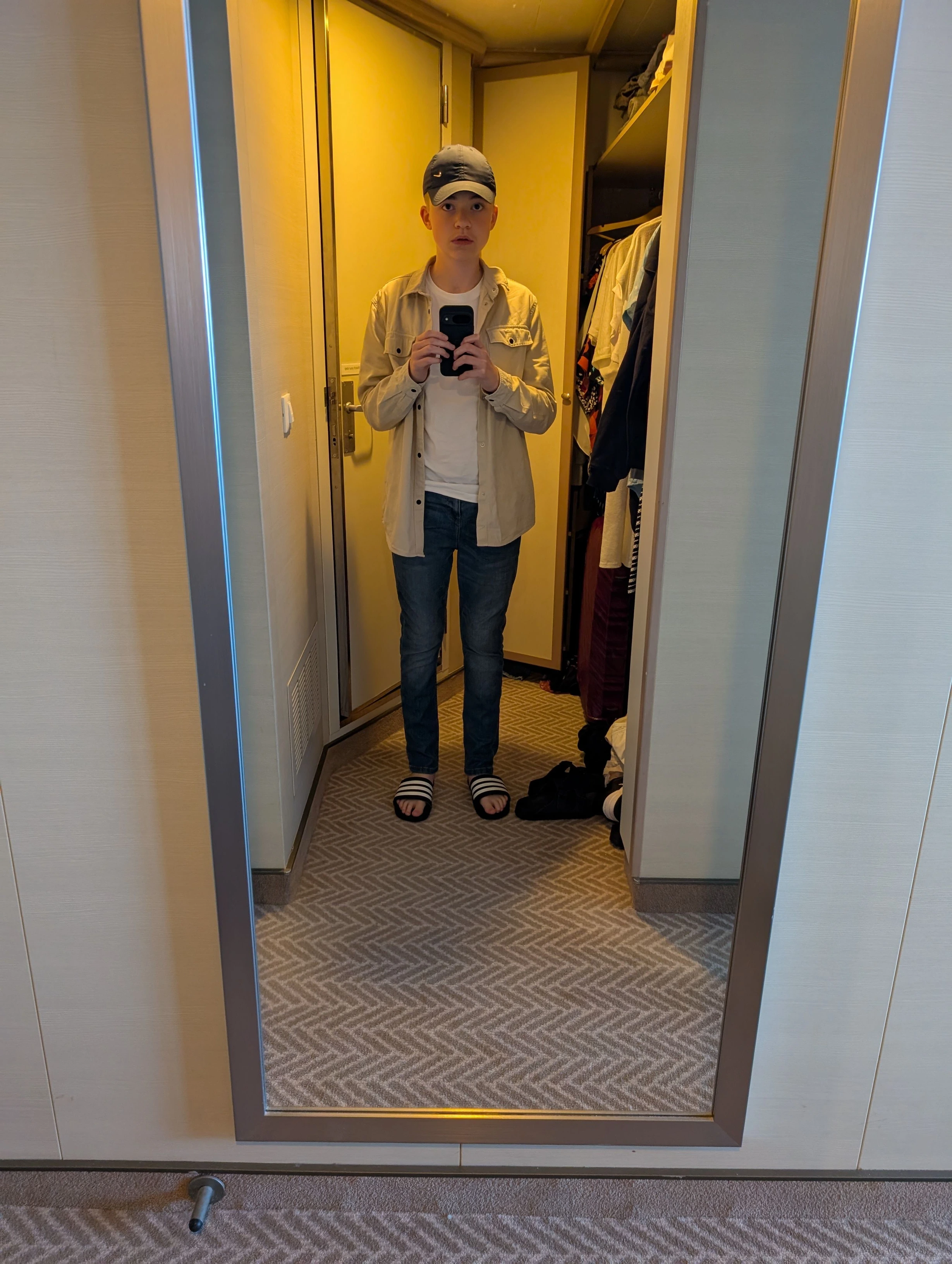 Casual Misstep: Beige Shirt, Basic Jeans, and the Polarizing Socks with Sandals