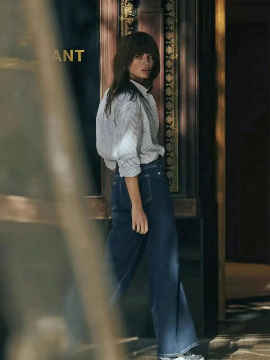 Effortlessly Stylish in Striped Button-Up Shirt and Wide-Leg Jeans